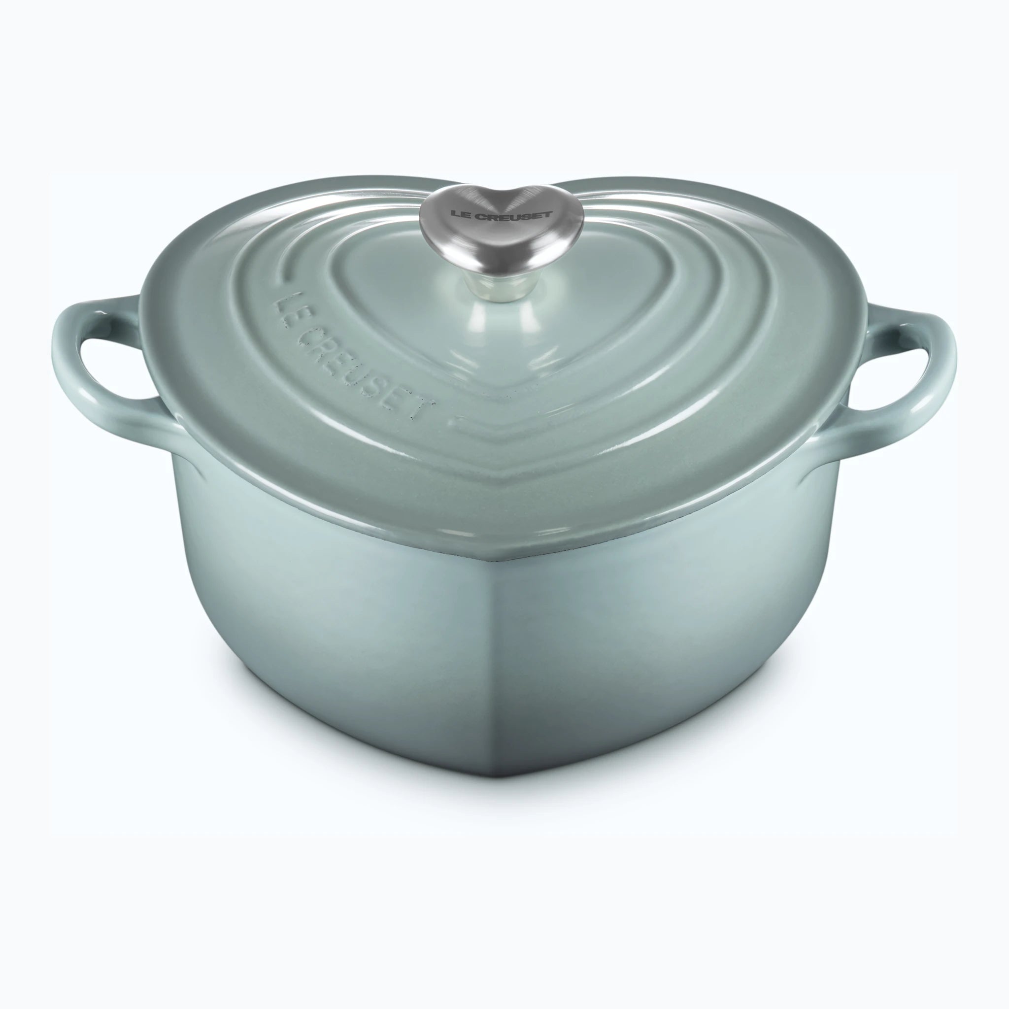 Cast iron heart shaped casserole in Sea Salt, a pale green heart-shaped pot with a stainless steel heart for a knob