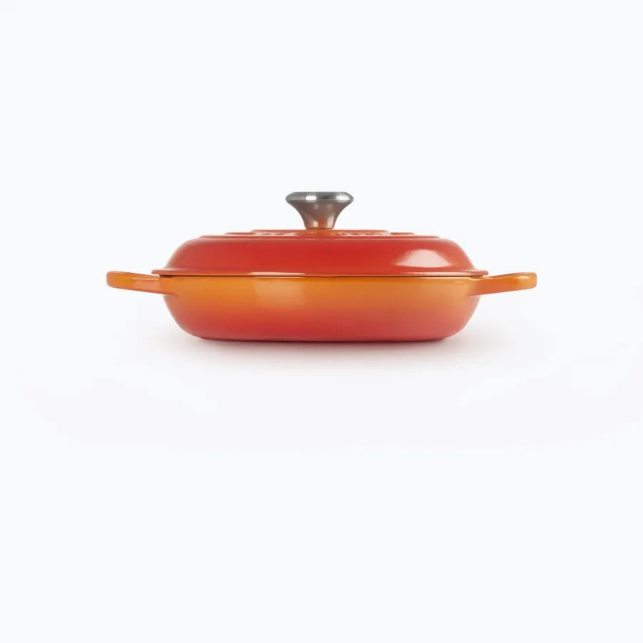 The shallow casserole seen from the side, showing how low the sides are compared with a standard casserole